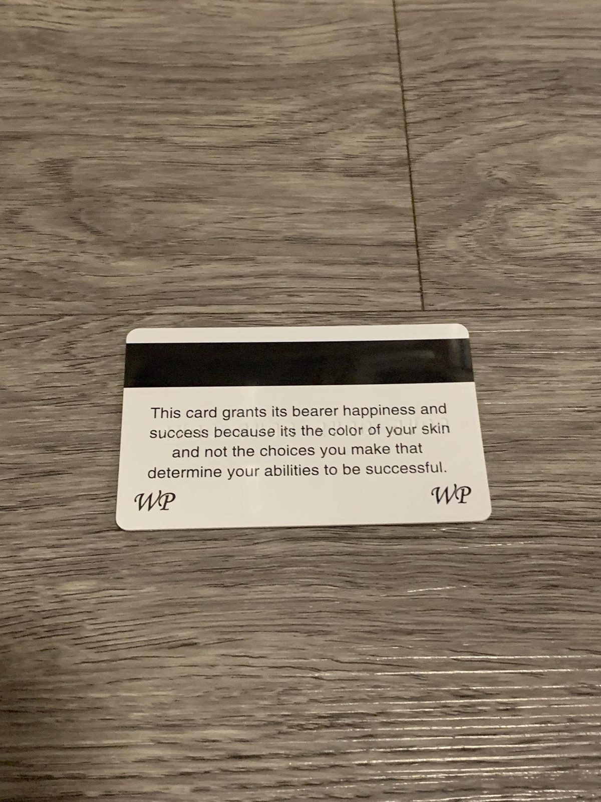 Back of the White Privilege Card gag card